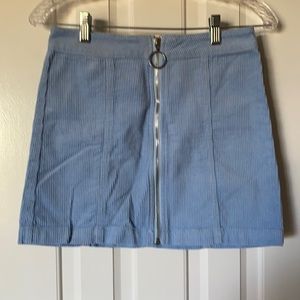 Carolina blue zip front corduroy mini skirt.